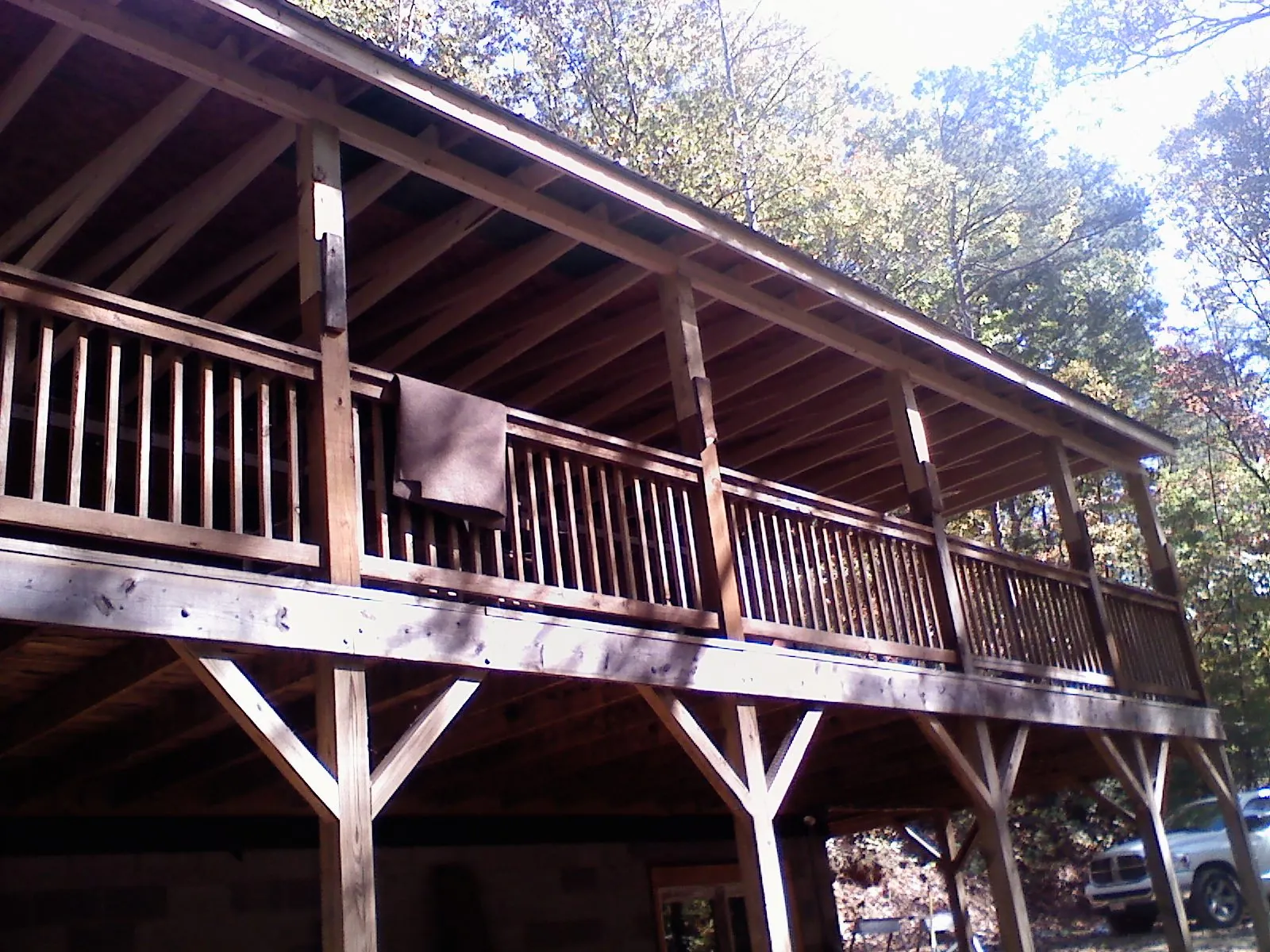 Timber framing under a new elevated porch and deck — Roof Leak Repair in Kawkawlin by Roofing Brothers